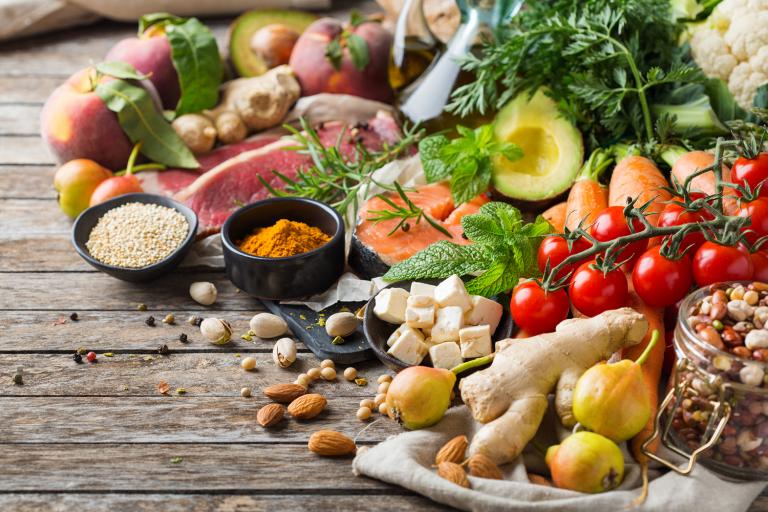 Assortment of healthy food ingredients for a Flexitarian diet on a wooden kitchen table